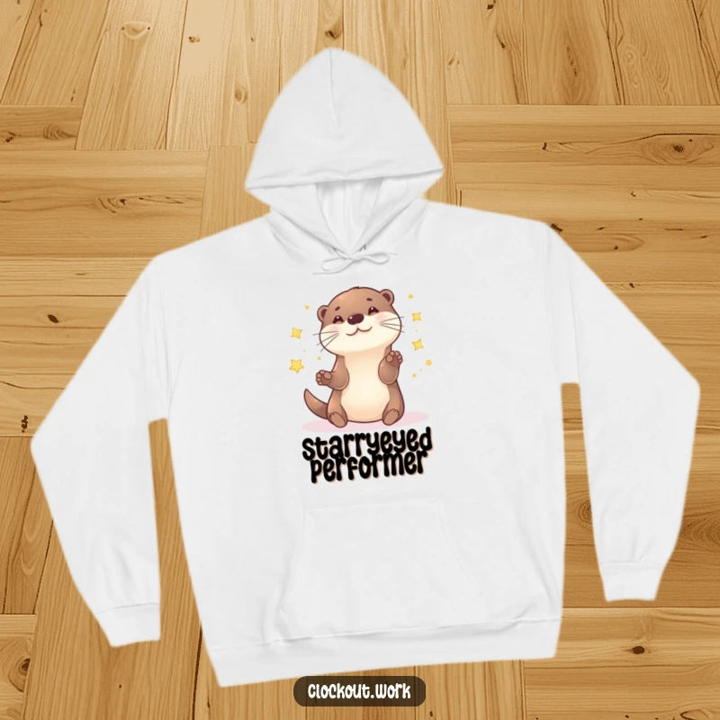 Funny Hoodie featuring a joyful otter expertly tossing and catching small, radiant stars in a starry void.