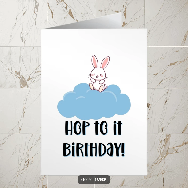 Funny Free Printable Birthday Card: A joyful rabbit gleefully bouncing high on a soft, dark blue, fluffy cloud, dreaming.
